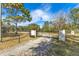 Private gated entrance to a large property at 2140 W State Road 46, Geneva, FL 32732