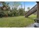 Large backyard with wooden stairs at 245 Scottsdale Sq # 245, Winter Park, FL 32792