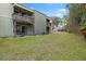 Spacious backyard with grassy area at 245 Scottsdale Sq # 245, Winter Park, FL 32792