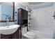 Bathroom features a sink, toilet, and tub at 245 Scottsdale Sq # 245, Winter Park, FL 32792