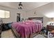 King-size bed in a well-lit bedroom at 245 Scottsdale Sq # 245, Winter Park, FL 32792