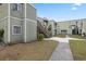 Exterior view of building with walkway at 245 Scottsdale Sq # 245, Winter Park, FL 32792