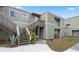 Building exterior with stairs and landscaping at 245 Scottsdale Sq # 245, Winter Park, FL 32792