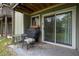 Private patio with seating and grill area at 245 Scottsdale Sq # 245, Winter Park, FL 32792