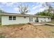 The backyard features a well maintained patio area with a grill and seating, perfect for entertaining at 24908 County Road 561, Astatula, FL 34705