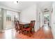Bright dining area with access to the backyard, perfect for indoor-outdoor dining experiences at 24908 County Road 561, Astatula, FL 34705