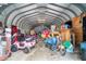 Spacious garage interior featuring durable metal walls, storage space, and ample room for projects at 24908 County Road 561, Astatula, FL 34705
