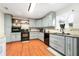 Stylish kitchen with modern appliances, updated countertops, and ample natural light at 24908 County Road 561, Astatula, FL 34705