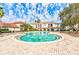 Large community pool featuring ample lounge seating, beautiful landscaping and splash fountains at 2740 Maitland Crossing Way # 102, Orlando, FL 32810