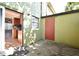 Exterior view of private backyard space with door leading to interior at 3208 Oak Lawn Pl # 218, Winter Park, FL 32792