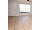Open concept living room with neutral paint, ceiling fan, and tile floors at 3208 Oak Lawn Pl # 218, Winter Park, FL 32792