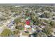Aerial view pinpoints this charming single Gathering home nestled amidst mature trees in a serene neighborhood at 3309 Drake Dr, Orlando, FL 32810
