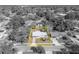 Monochrome aerial view highlighting property lines of a quaint single-Gathering home surrounded by mature trees at 3309 Drake Dr, Orlando, FL 32810