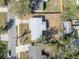 Aerial view of property showing roof, lot lines, and surrounding neighborhood at 3309 Drake Dr, Orlando, FL 32810
