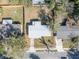 Aerial view of the property showcasing the roof, lot lines, and surrounding neighborhood at 3309 Drake Dr, Orlando, FL 32810