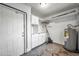 Finished basement features ample storage, cabinetry and access to the exterior at 3309 Drake Dr, Orlando, FL 32810