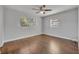 This bright bedroom has hardwood floors and dual windows at 3309 Drake Dr, Orlando, FL 32810