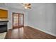 Dining area with hardwood floors and view of the kitchen at 3309 Drake Dr, Orlando, FL 32810
