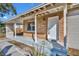 Charming single story house with brick facade, white trim and covered porch at 3309 Drake Dr, Orlando, FL 32810