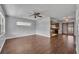 Open concept living area with hardwood floors, and view of the kitchen at 3309 Drake Dr, Orlando, FL 32810