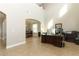 Bright living room features high ceilings, an archway, and neutral paint at 341 Skyview Pl, Chuluota, FL 32766