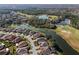 Aerial view of home with water view and golf course at 442 Treviso Dr, Poinciana, FL 34759