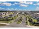 New construction community with sidewalks, landscaping, and various home styles at 4425 Lions Gate Ave, Clermont, FL 34711