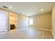 Spacious bedroom with natural light, neutral walls, and connecting bathroom at 4425 Lions Gate Ave, Clermont, FL 34711