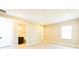 Bright bedroom featuring wood-look flooring, neutral walls, and connecting bathroom at 4425 Lions Gate Ave, Clermont, FL 34711