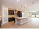 Modern kitchen features sleek countertops, stainless steel appliances, and an open layout at 4425 Lions Gate Ave, Clermont, FL 34711