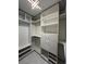 Large walk-in closet with ample shelving and hanging space at 4854 S Semoran Blvd # 2203, Orlando, FL 32822