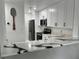 Modern kitchen with white cabinets and quartz countertops at 4854 S Semoran Blvd # 2203, Orlando, FL 32822