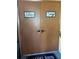 Condo laundry room with double doors at 4854 S Semoran Blvd # 2203, Orlando, FL 32822