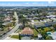 Aerial shot showcasing property's large lot, mature trees, and proximity to local amenities at 549 Constitution Dr, Orlando, FL 32809