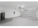 Spacious two-car garage with ample storage space and water heater at 6732 Sw 132Nd St, Ocala, FL 34473
