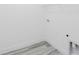 Functional laundry area with clean finishes, washer hookup, and convenient storage at 6732 Sw 132Nd St, Ocala, FL 34473