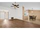 Open dining area with tile floors and adjacent kitchen at 6749 Crescent Ridge Rd, Orlando, FL 32810