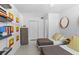 Shared bedroom featuring two beds, modern decor, and floating bookshelves at 6877 S Atlantic Ave, New Smyrna Beach, FL 32169