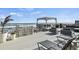 Spacious deck with comfortable seating, perfect for enjoying ocean views and outdoor living at 6877 S Atlantic Ave, New Smyrna Beach, FL 32169
