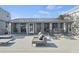 Inviting deck furnished with sleek outdoor seating, perfect for enjoying the serene ocean views and outdoor living at 6877 S Atlantic Ave, New Smyrna Beach, FL 32169