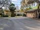 Two-story home with stone facade and attached garage at 9430 Kilgore Rd, Orlando, FL 32836