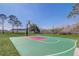 Full basketball court on a well-maintained lot, perfect for recreational games at 9716 Pecky Cypress Way, Orlando, FL 32836