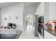 Contemporary kitchen featuring stainless steel appliances and white cabinetry at 9716 Pecky Cypress Way, Orlando, FL 32836