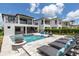 Relaxing pool and spa with water features and plenty of seating at 1039 Jack Nicklaus Ct, Kissimmee, FL 34747