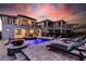Luxury pool with fountains, spa, and lounge chairs at 1039 Jack Nicklaus Ct, Kissimmee, FL 34747