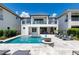 Private backyard with a beautiful pool, spa, and fire pit at 1039 Jack Nicklaus Ct, Kissimmee, FL 34747