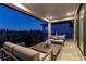 Covered balcony with outdoor seating and city views at 1039 Jack Nicklaus Ct, Kissimmee, FL 34747
