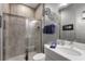 Clean bathroom with single vanity, shower, and toilet at 1039 Jack Nicklaus Ct, Kissimmee, FL 34747