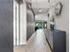 Bright entryway with gray walls, wood-look floors, and modern decor at 1039 Jack Nicklaus Ct, Kissimmee, FL 34747