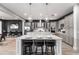 Spacious kitchen with gray cabinets, white island, and stainless steel appliances at 1039 Jack Nicklaus Ct, Kissimmee, FL 34747